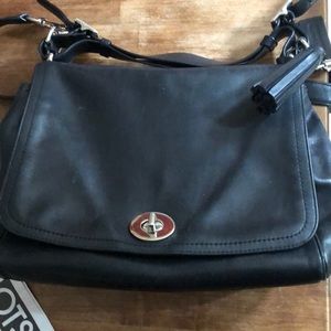 Black coach leather bag with tassel long strap